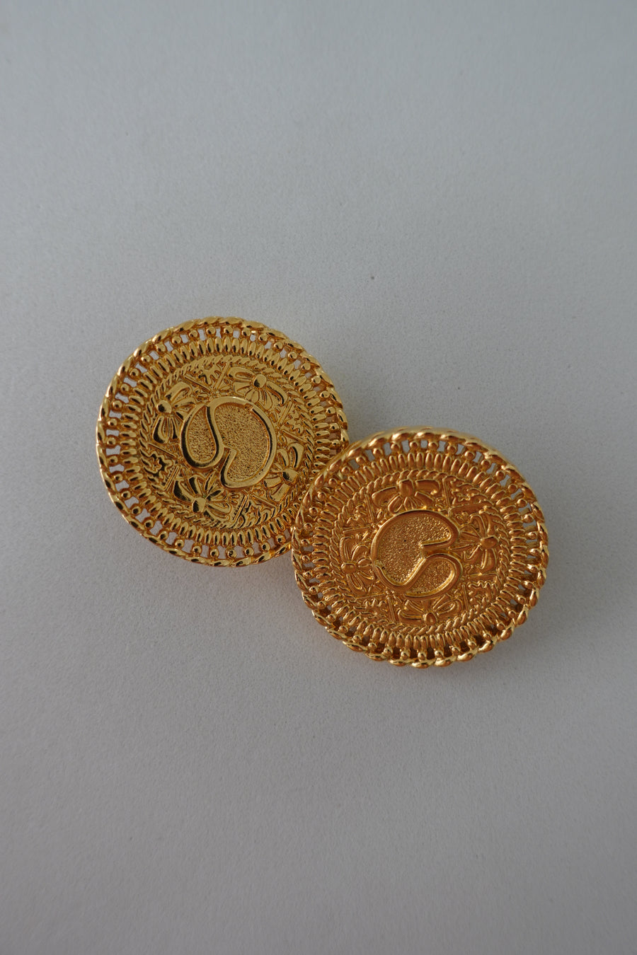 St. John Round Logo Clip-on Earrings